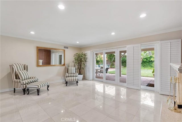 6636 Wooster Ave, Los Angeles, CA 90056 - living area with light tile patterned flooring, recessed lighting, and ornamental molding