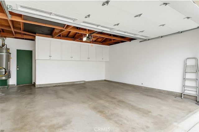 6636 Wooster Ave, Los Angeles, CA 90056 - garage with secured water heater and a garage door opener