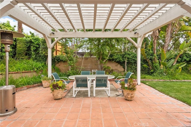 6636 Wooster Ave, Los Angeles, CA 90056 - fenced backyard featuring a patio area, outdoor dining area, and a pergola