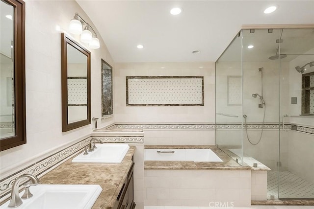 6636 Wooster Ave, Los Angeles, CA 90056 - full bathroom with a stall shower, a bath, double vanity, and recessed lighting