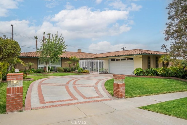 6636 Wooster Ave, Los Angeles, CA 90056 - view of front of property with a tile roof, driveway, a garage, a front yard, and a chimney