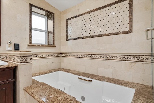 6636 Wooster Ave, Los Angeles, CA 90056 - full bath with a tub with jets, vanity, and tile walls