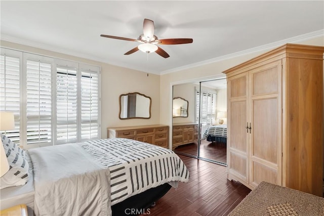 6636 Wooster Ave, Los Angeles, CA 90056 - bedroom featuring dark wood-style flooring, ornamental molding, a ceiling fan, and a closet