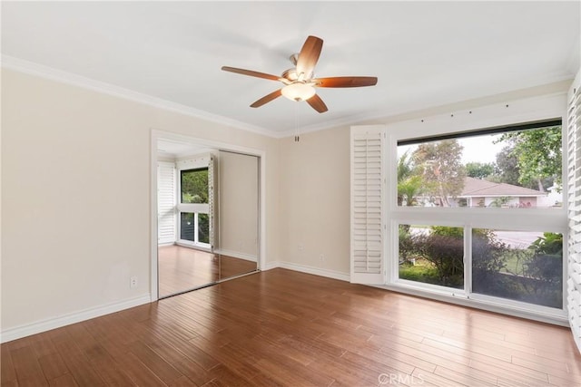 6636 Wooster Ave, Los Angeles, CA 90056 - spare room with a ceiling fan, wood finished floors, and ornamental molding