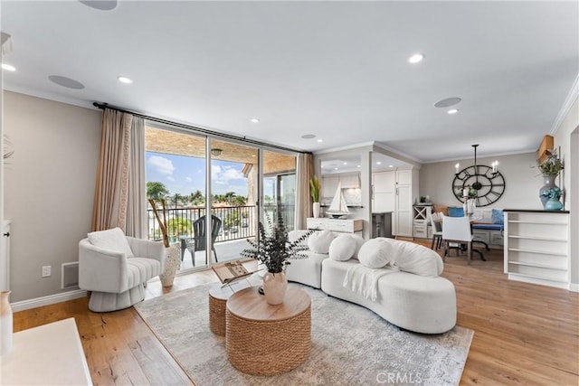 201 Bay Shore Ave Unit 305, Long Beach, CA 90803 - living area featuring ornamental molding, light wood-style flooring, a chandelier, and recessed lighting