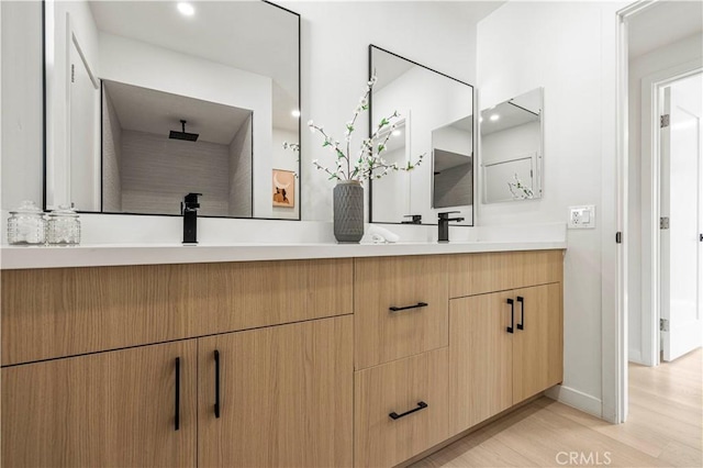 2414 Las Positas Rd, Glendale, CA 91208 - bathroom with double vanity and wood finished floors