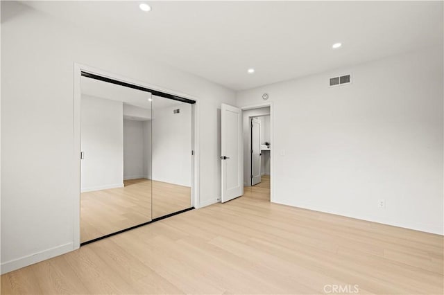 2414 Las Positas Rd, Glendale, CA 91208 - unfurnished bedroom with light wood-type flooring, recessed lighting, and a closet