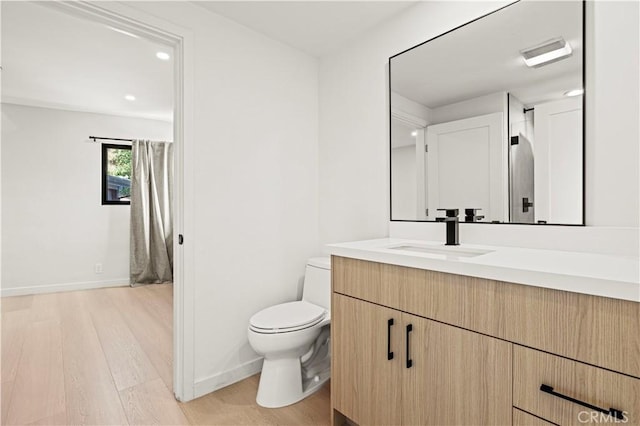 2414 Las Positas Rd, Glendale, CA 91208 - bathroom featuring wood finished floors, vanity, and recessed lighting