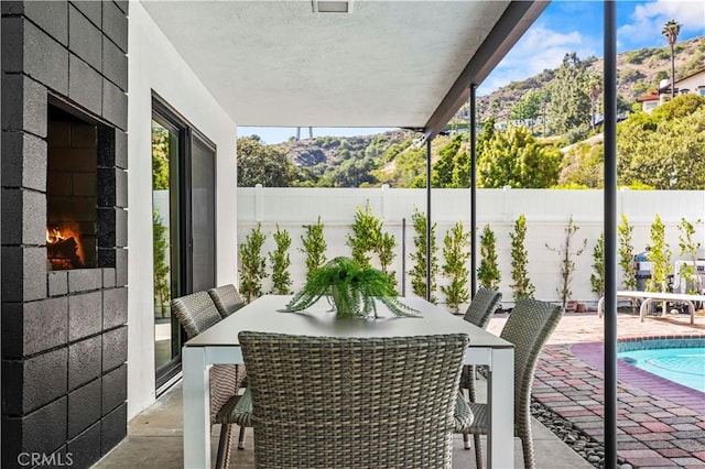2414 Las Positas Rd, Glendale, CA 91208 - fenced backyard featuring a patio area, a mountain view, and outdoor dining area