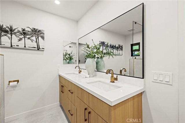 2414 Las Positas Rd, Glendale, CA 91208 - bathroom featuring double vanity and baseboards