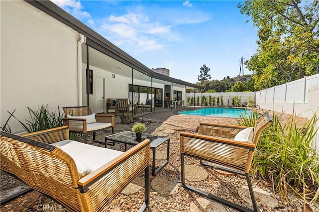 2414 Las Positas Rd, Glendale, CA 91208 - view of pool featuring a patio, a fenced backyard, and an outdoor living space