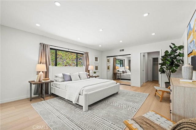 2414 Las Positas Rd, Glendale, CA 91208 - bedroom with recessed lighting, light wood-type flooring, and multiple closets