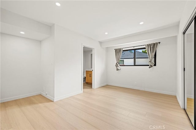 2414 Las Positas Rd, Glendale, CA 91208 - unfurnished bedroom with light wood finished floors, recessed lighting, a closet, and ensuite bathroom