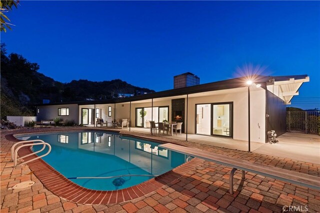 2414 Las Positas Rd, Glendale, CA 91208 - pool at night with a patio