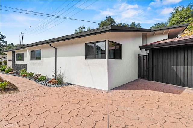 2414 Las Positas Rd, Glendale, CA 91208 - view of property exterior with stucco siding and a patio