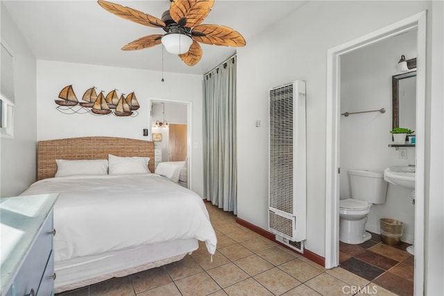 35171 Beach Rd, Dana Point, CA 92624 - bedroom featuring a heating unit, ensuite bath, a ceiling fan, and light tile patterned floors
