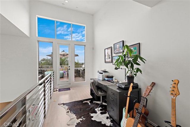 4151 Redwood Ave Unit 106, Los Angeles, CA 90066 - office area featuring wood finished floors, recessed lighting, and a high ceiling