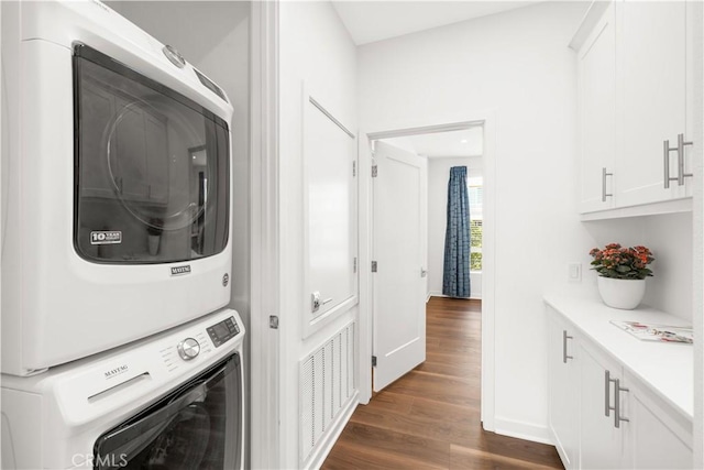 2256 Synergy, Irvine, CA 92614 - laundry room featuring stacked washer and clothes dryer and dark wood-style flooring