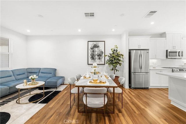 2256 Synergy, Irvine, CA 92614 - living room with light wood-style flooring and recessed lighting
