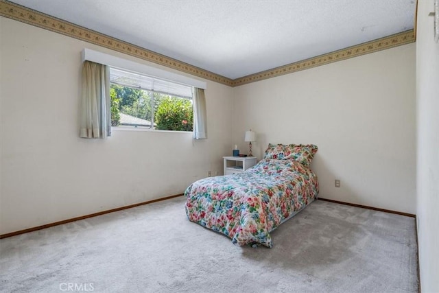 1283 W Newport St, San Luis Obispo, CA 93405 - carpeted bedroom featuring baseboards and a textured ceiling