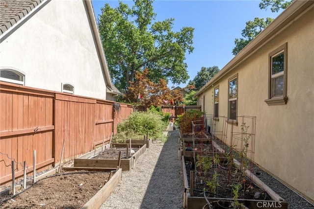 17 Arminta Ct, Chico, CA 95928 - fenced backyard with a vegetable garden