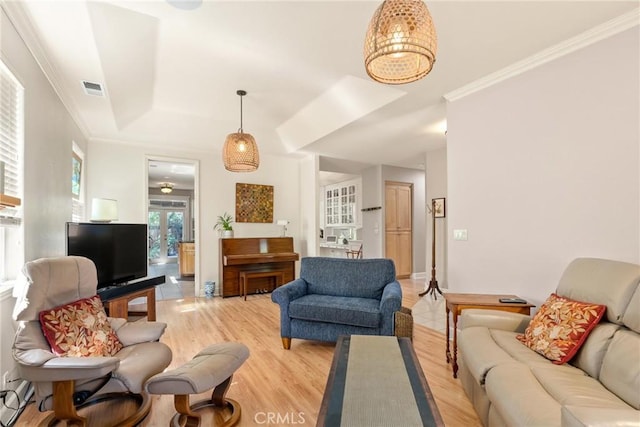 17 Arminta Ct, Chico, CA 95928 - living room featuring light wood finished floors, crown molding, and baseboard heating