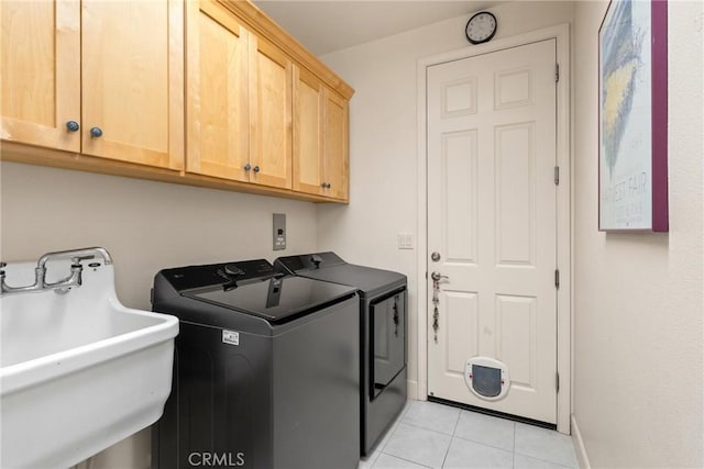 17 Arminta Ct, Chico, CA 95928 - washroom featuring cabinet space, independent washer and dryer, and light tile patterned floors