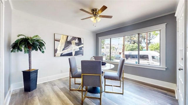 243 N Verdugo Rd, Glendale, CA 91206 - dining area featuring wood finished floors, ceiling fan, and crown molding