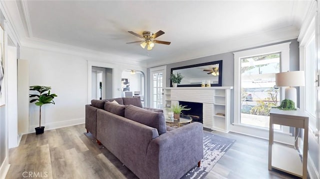 243 N Verdugo Rd, Glendale, CA 91206 - living room featuring ceiling fan, plenty of natural light, wood finished floors, and crown molding