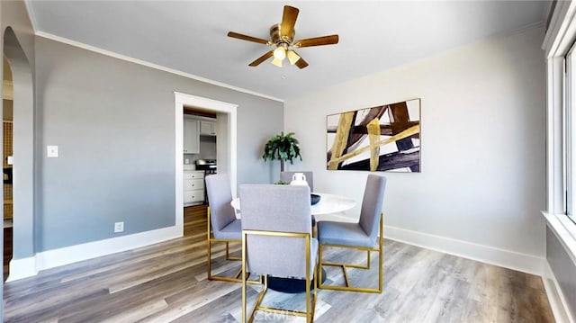 243 N Verdugo Rd, Glendale, CA 91206 - dining area with ceiling fan, ornamental molding, wood finished floors, and arched walkways