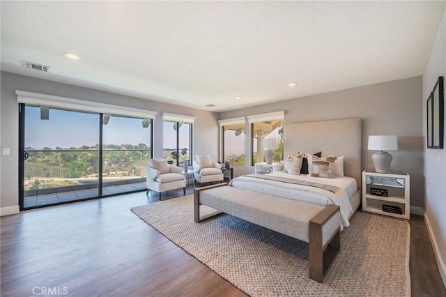15541 Aqua Verde Dr, Los Angeles, CA 90077 - bedroom with access to outside, wood finished floors, and recessed lighting