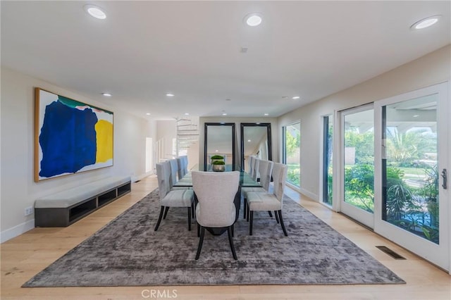 15541 Aqua Verde Dr, Los Angeles, CA 90077 - dining space with recessed lighting and wood finished floors