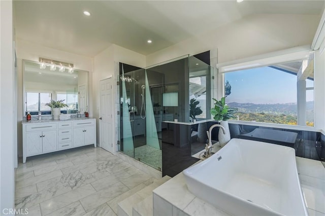 15541 Aqua Verde Dr, Los Angeles, CA 90077 - bathroom featuring vanity, a soaking tub, marble finish floors, a shower stall, and vaulted ceiling