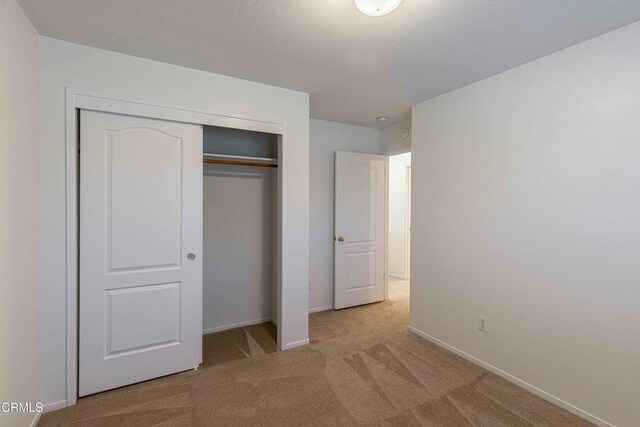 4810 Bluestone Dr, Bakersfield, CA 93311 - unfurnished bedroom featuring carpet and a closet