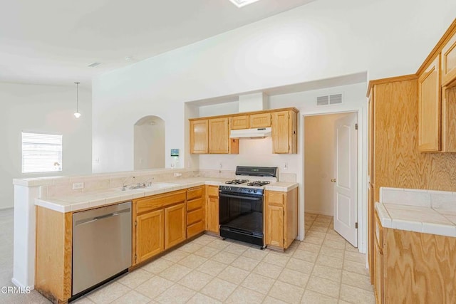 4810 Bluestone Dr, Bakersfield, CA 93311 - kitchen featuring dishwasher, gas range, under cabinet range hood, a peninsula, and arched walkways