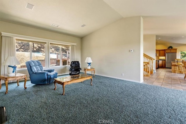 8412 Alta Vista Ave, Atascadero, CA 93422 - living area with lofted ceiling, light carpet, and stairs