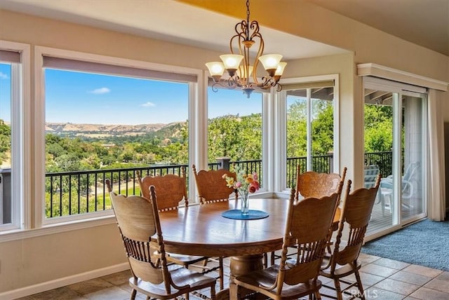 8412 Alta Vista Ave, Atascadero, CA 93422 - dining space featuring a chandelier and baseboards