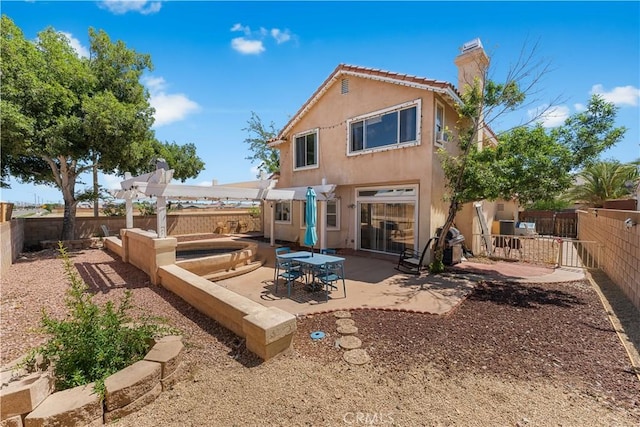 44559 Aspen St, Lancaster, CA 93535 - rear view of house featuring a chimney, a fenced backyard, and stucco siding
