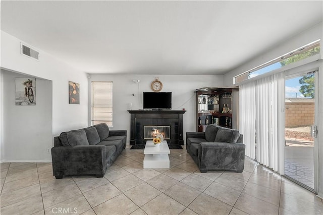 44559 Aspen St, Lancaster, CA 93535 - living area featuring a tile fireplace and light tile patterned floors