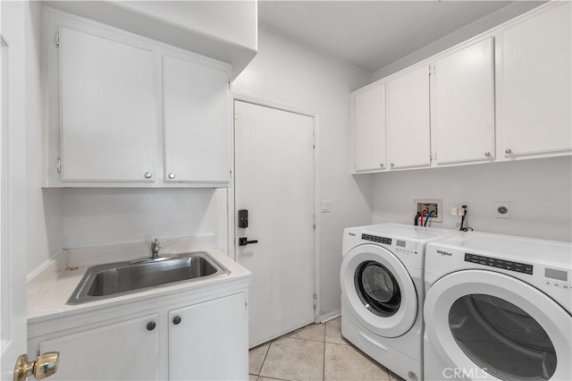 44559 Aspen St, Lancaster, CA 93535 - laundry area with cabinet space, separate washer and dryer, and light tile patterned floors