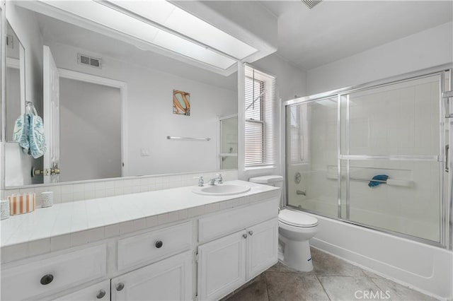 44559 Aspen St, Lancaster, CA 93535 - bathroom with vanity, combined bath / shower with glass door, and tile patterned flooring