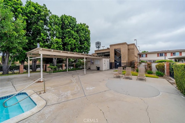 631 W 6th St Unit D, Tustin, CA 92780 - view of patio with a community pool