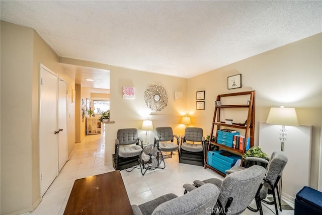 631 W 6th St Unit D, Tustin, CA 92780 - living room featuring a textured ceiling