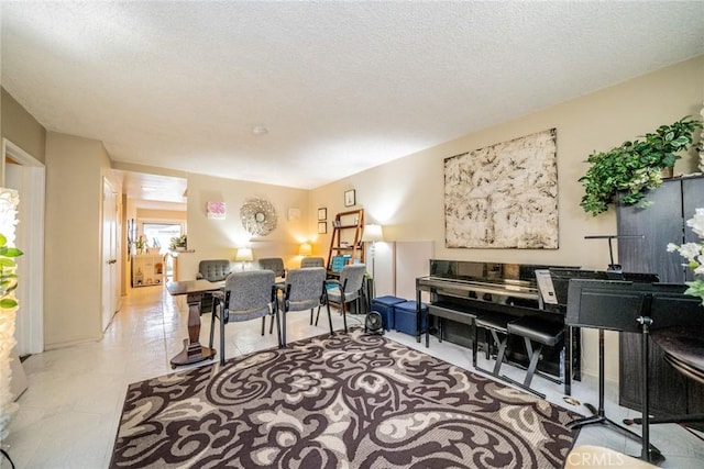 631 W 6th St Unit D, Tustin, CA 92780 - living room featuring a textured ceiling