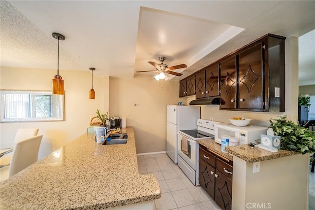 631 W 6th St Unit D, Tustin, CA 92780 - kitchen featuring white appliances, under cabinet range hood, a peninsula, dark brown cabinetry, and a ceiling fan