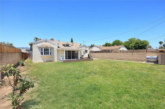 1834 E Stuart Ave, West Covina, CA 91791 - back of house with a fenced backyard and stucco siding
