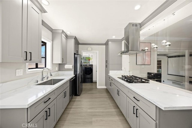 1834 E Stuart Ave, West Covina, CA 91791 - kitchen featuring stainless steel appliances, island exhaust hood, gray cabinets, washer / clothes dryer, and ornamental molding