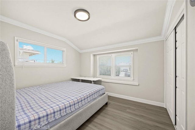 1834 E Stuart Ave, West Covina, CA 91791 - bedroom featuring ornamental molding, vaulted ceiling, wood finished floors, and a closet