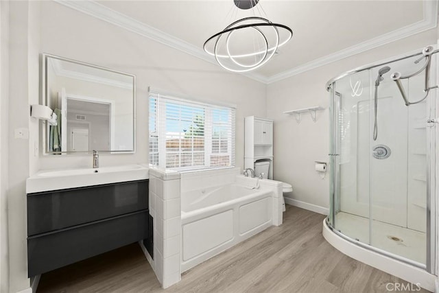 1834 E Stuart Ave, West Covina, CA 91791 - full bathroom featuring a shower stall, wood finished floors, crown molding, a bath, and vanity