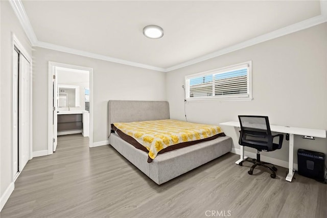 1834 E Stuart Ave, West Covina, CA 91791 - bedroom with ornamental molding, light wood-style floors, and a closet